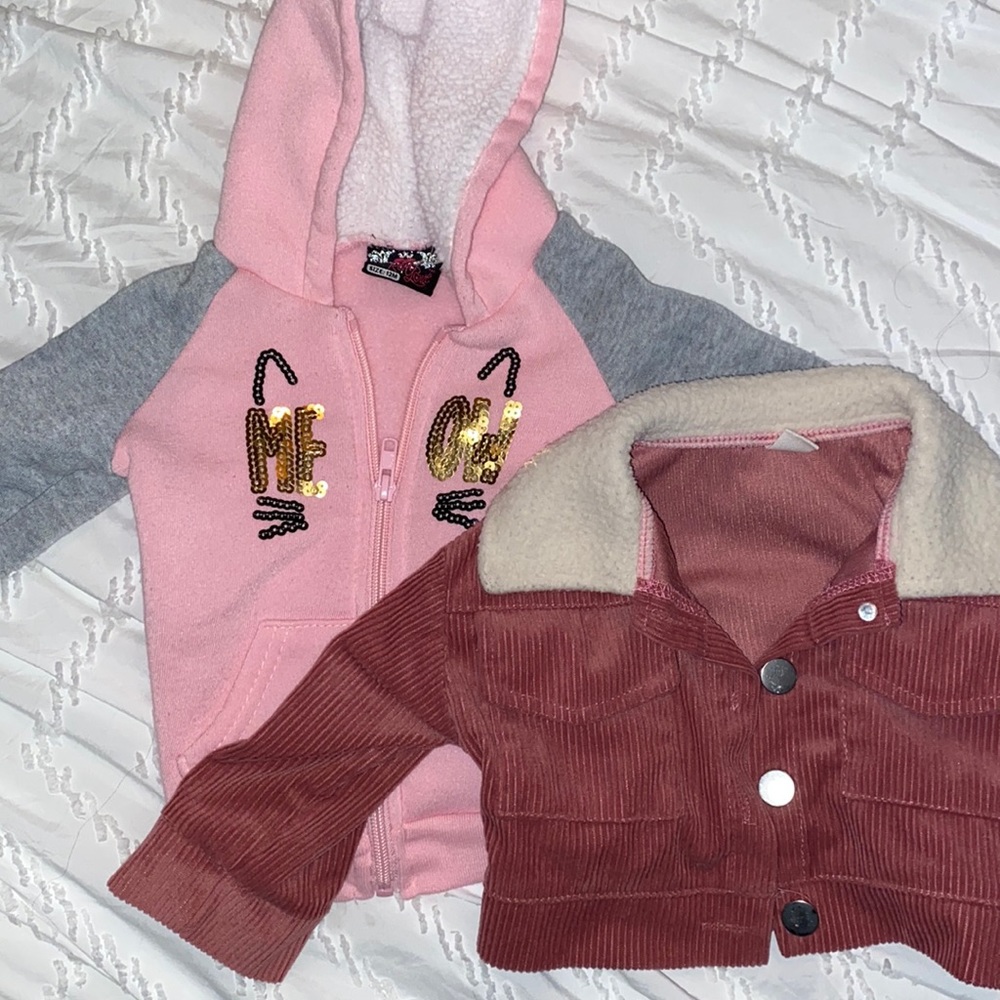 2 little girl pink jackets